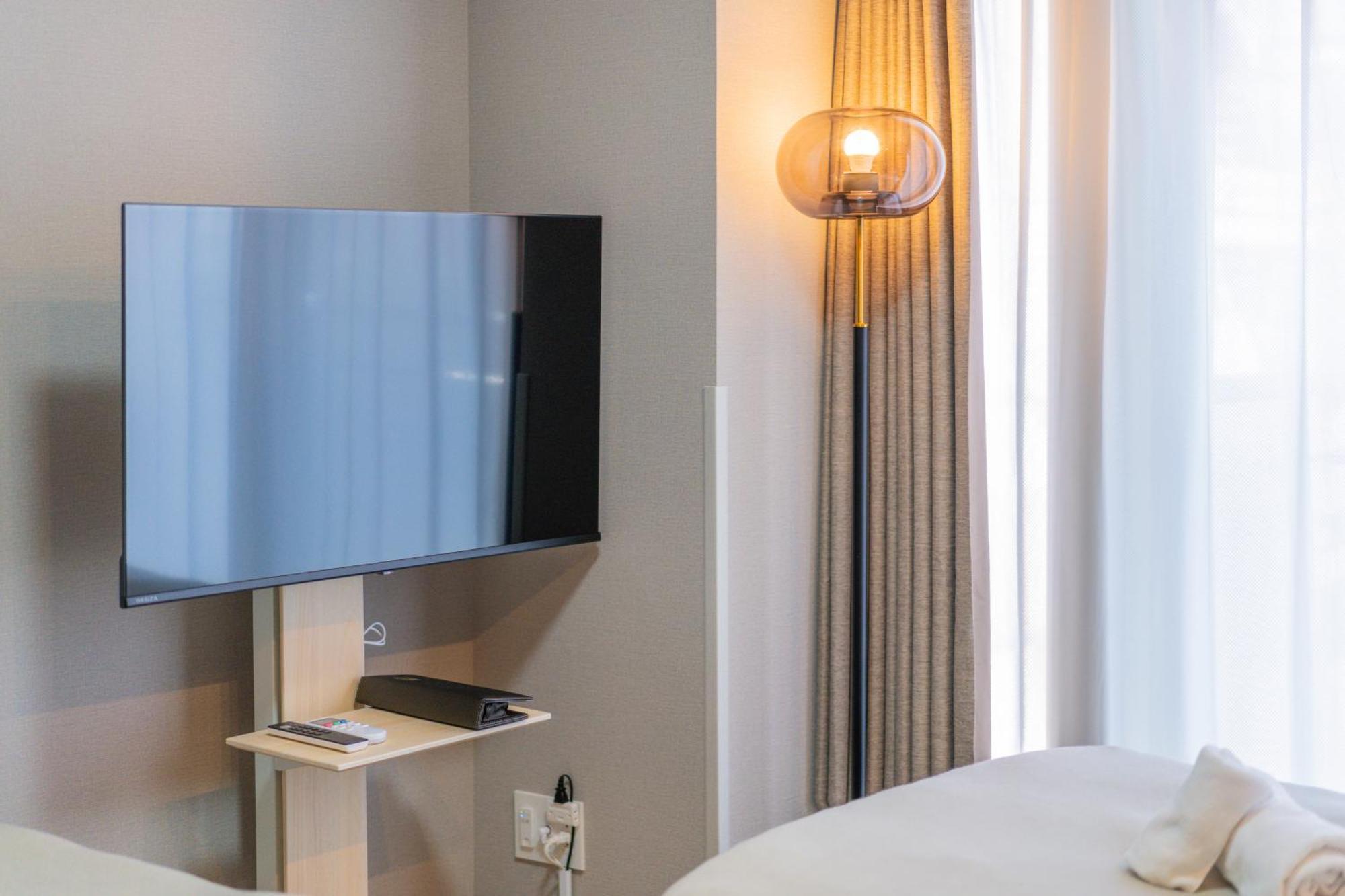 Apartment Hotel 11 Umeda Kamiyama โอซาก้า ภายนอก รูปภาพ