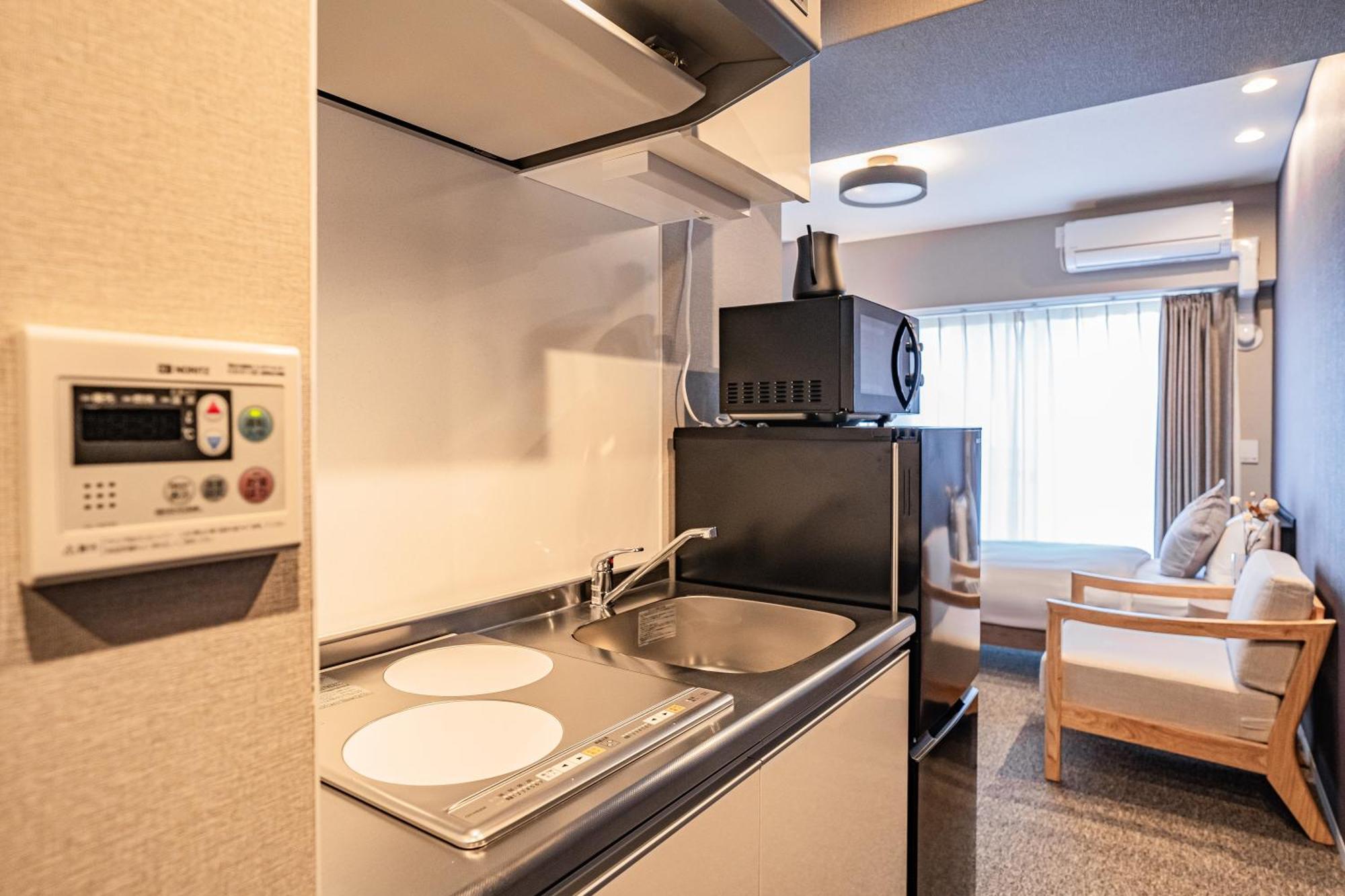 Apartment Hotel 11 Umeda Kamiyama โอซาก้า ภายนอก รูปภาพ