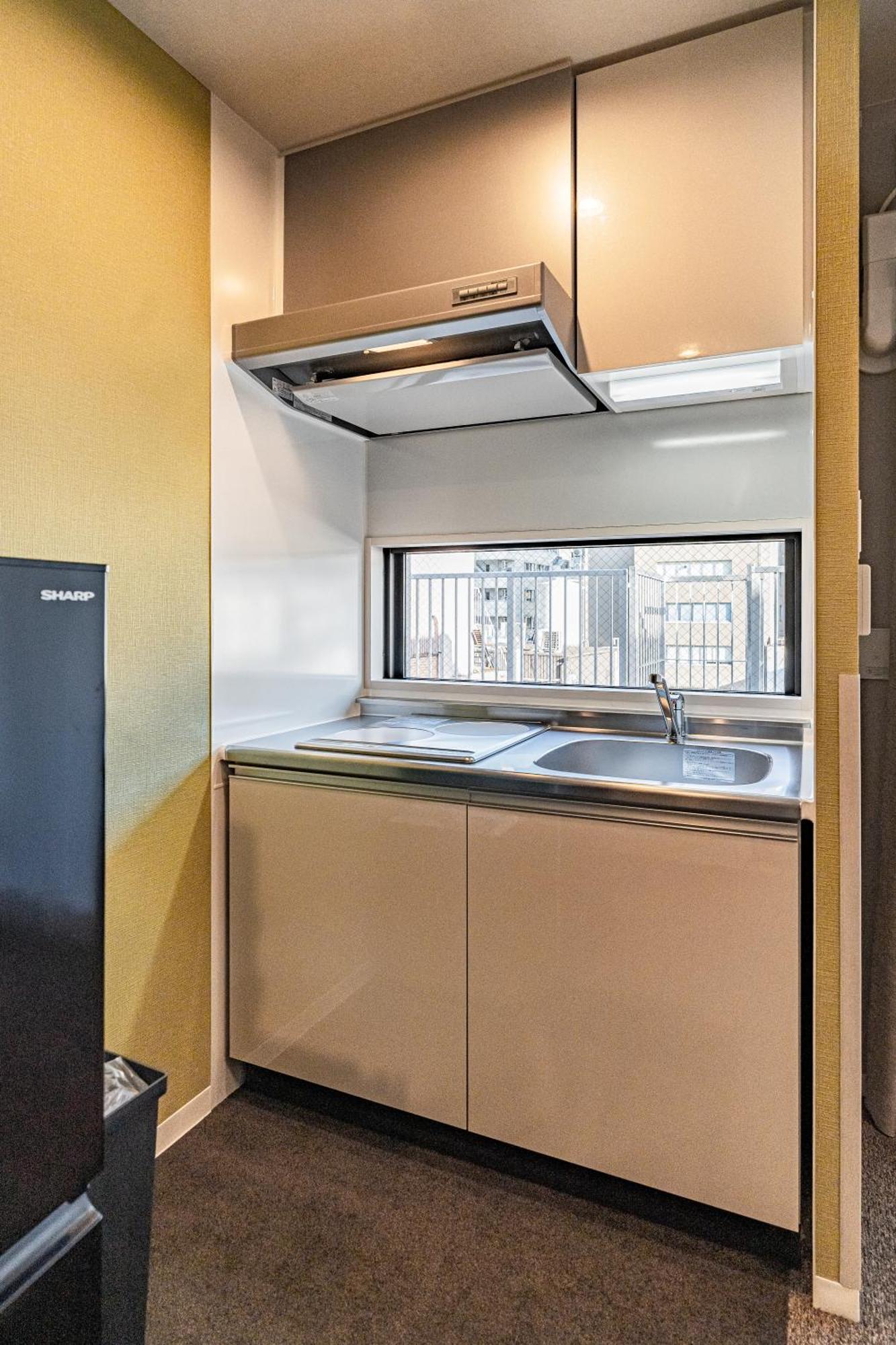 Apartment Hotel 11 Umeda Kamiyama โอซาก้า ภายนอก รูปภาพ